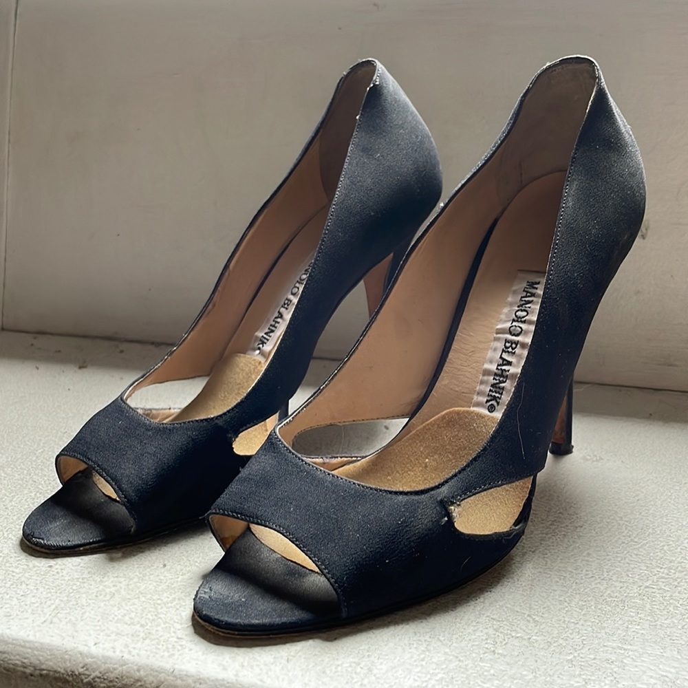 Black open toe Manolo Blahnik Heels. Good condition some signs of wear